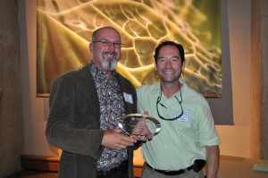 David Salman (right) presents the Individual Partner Award to Kelly Grummons (left)